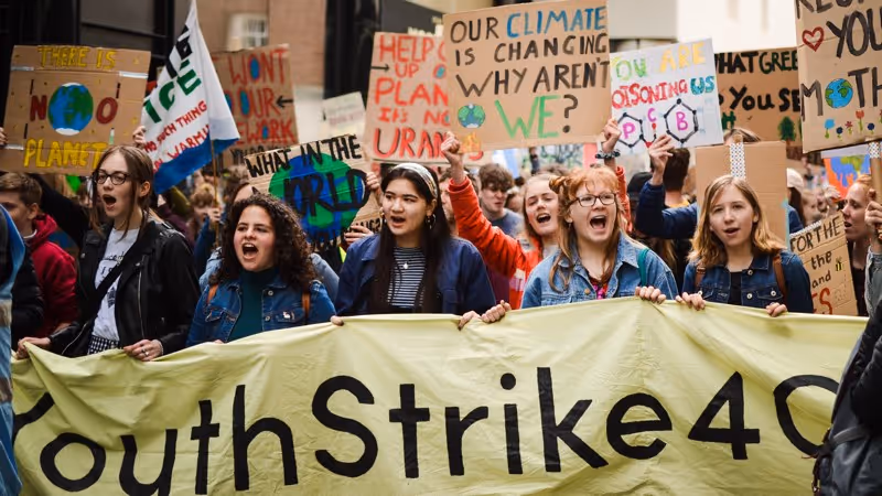 Exeter Youth Strike 4 Climate protestors with banner