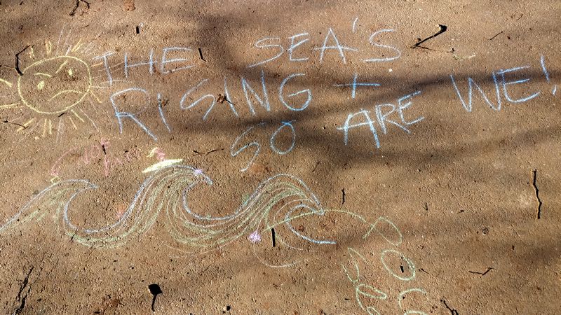 Exeter Youth Strike 4 Climate Sea is Rising chalk pavement art