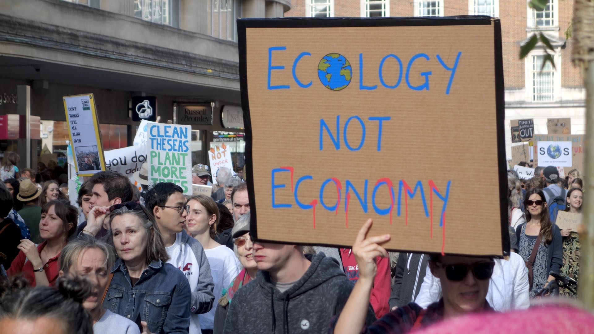 Exeter Global Climate Strike demonstrator holding placard