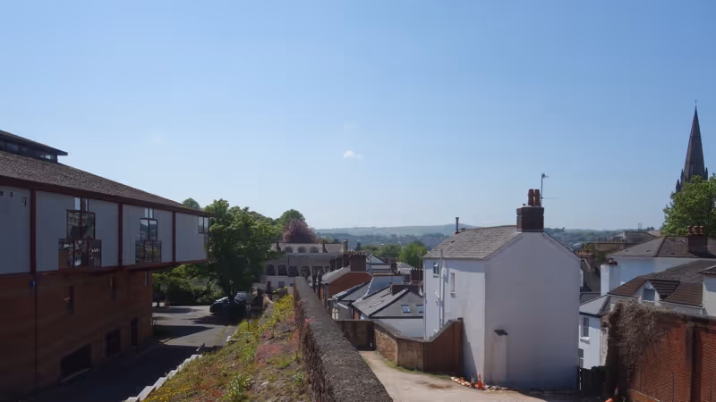 Harlequins shopping centre in context with Exeter city wall and Northernhay Street housing