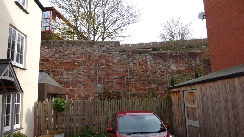 Exeter city wall behind private gardens in Northernhay Street