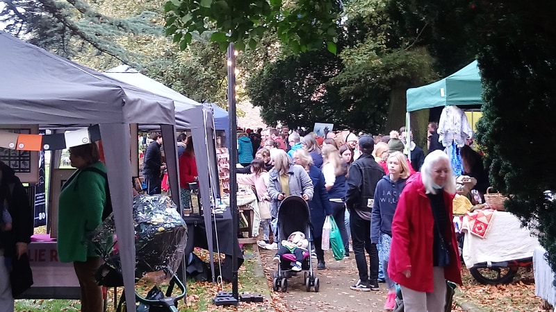 Crowds and stalls in St Thomas' churchyard
