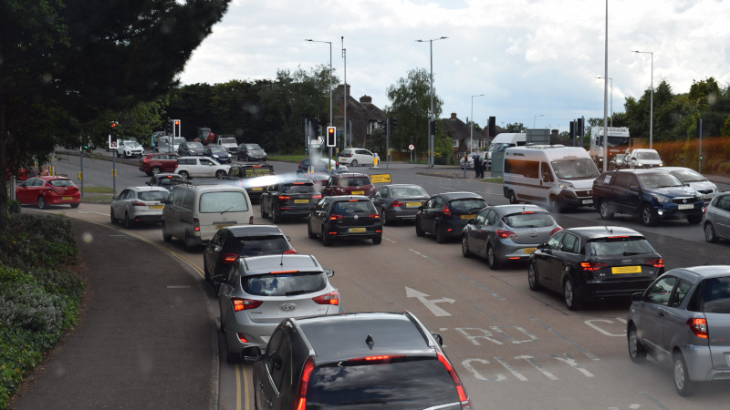 View from a bus stuck in Exeter traffic at a busy junction without priority lanes