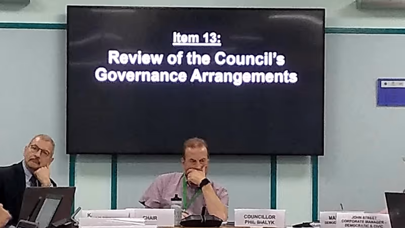 Karime Hassan and Phil Bialyk overseeing Exeter City Council scrutiny cuts in October 2019