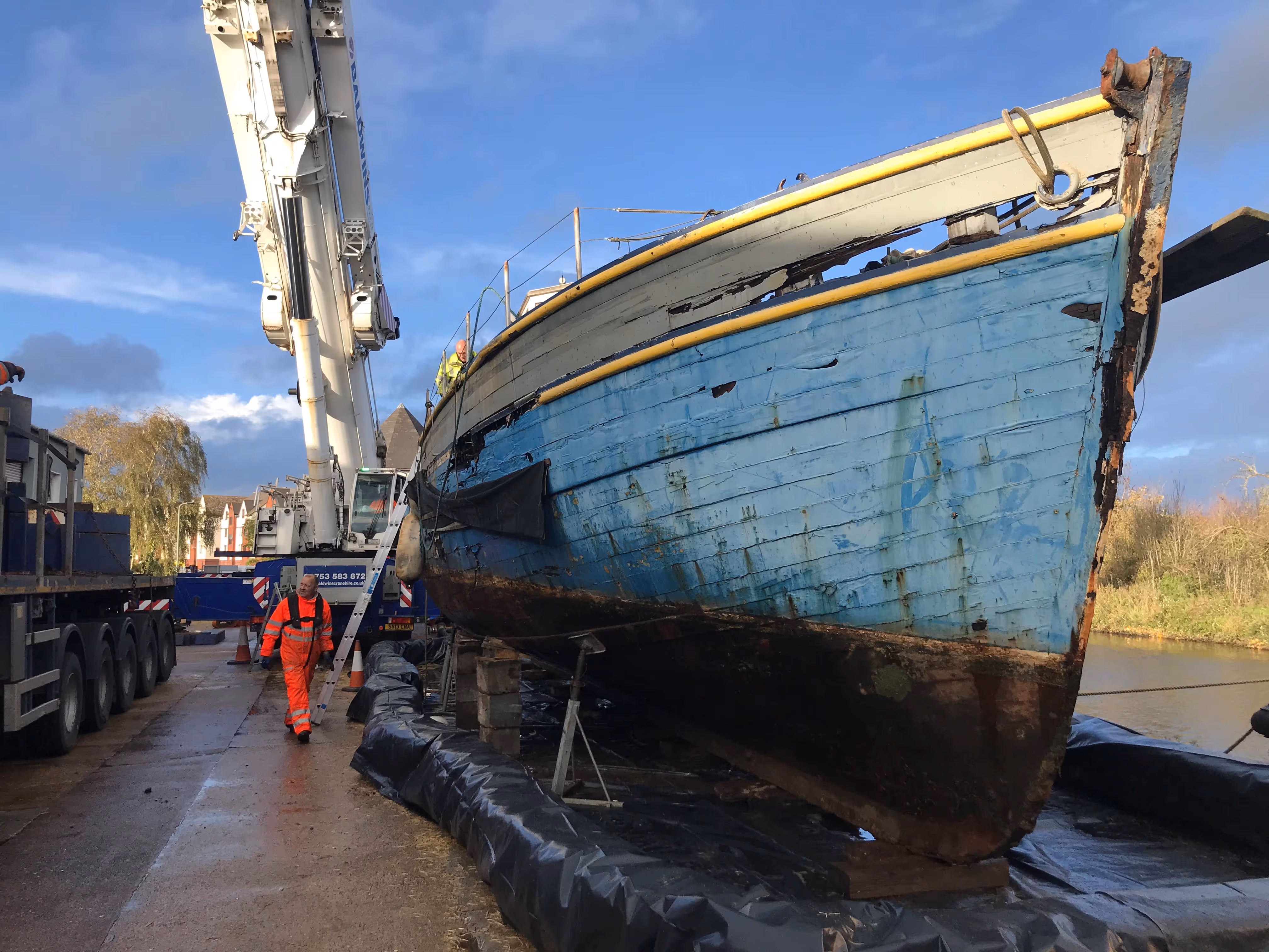Sunken 44-ton fishing boat after being craned out of Exeter Ship Canal at Gabriel's Wharf